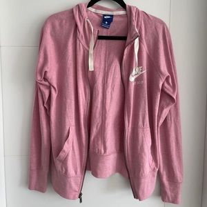 Nike size small pink zip sweater. Worn a handful of times, great condition.